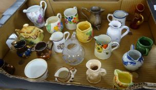 A collection of Jugs including Clarice Cliff and Royal Worcester.