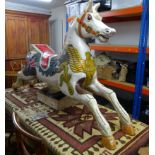 A carved wood and hand painted fair ground carousel Galloper horse, carved by Woody White a well