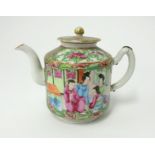 A small Chinese porcelain 'Famille Rose' teapot, height 11cm.