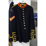 A collection of four various military uniforms (4).