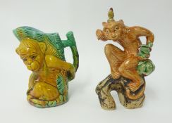 A majolica style monkey jug and dancing monkey group (2).