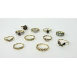 A collection of eleven 9ct dress rings in various settings, approx. 22.5g.