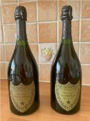 Two bottles of Moet et Chandon Cuvee Dom Perignon champagne, 1976 & 1975, 75ml.