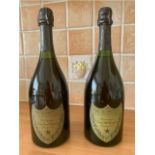 Two bottles of Moet et Chandon Cuvee Dom Perignon champagne, 1976 & 1975, 75ml.