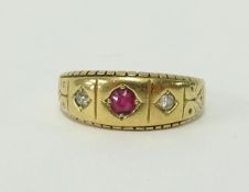 An 18ct ruby and diamond ring.