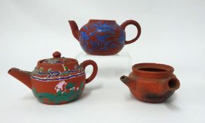 Three Yixing teapots, two lacking lids with enamel decoration.