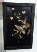 Chinese lacquered framed panel decorated in relief with birds and branch, height 70cm, width 45cm.