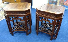 A pair of Chinese carved rosewood low tables, height 46cm, width 38cm.