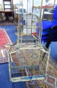 An antique painted wood birdcage, height 102cm.