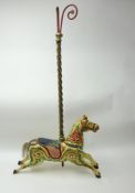 A late 19th/early 20th century fairground carousel galloper horse, with original brass twist column,