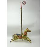 A late 19th/early 20th century fairground carousel galloper horse, with original brass twist column,