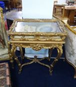 An ornate French Louis XVI gilt wood style table Vitrine on stand.