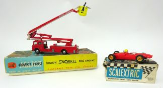 Corgi Toys, Simon Snorkel fire engine 1127, boxed together with Scalextric racing car (2).