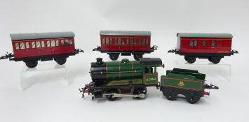 Hornby Clockwork Gauge 0 tinplate ‘British Railways’ Locomotive and Tender and three four-wheel