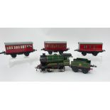 Hornby Clockwork Gauge 0 tinplate ‘British Railways’ Locomotive and Tender and three four-wheel