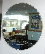 A large circular mirror, mid 20th century.