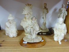 Three modern figurines signed A. Belcari, together with three other sculptures of oriental figures