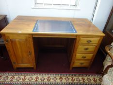 A good modern office desk fitted with cupboard and drawers with leather top together with a matching