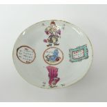 A Chinese porcelain saucer dish decorated with warriors and panels of text, underglaze marks,