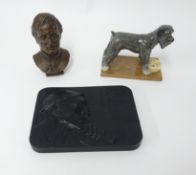 A black plaque signed G.Neunier, 15cm x 20cm, a moulded bust of nelson, and a Royal Doulton animal