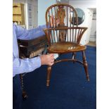 A reproduction child’s Windsor elbow chair by White Rose Furniture, height 68cm