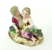 An early 20th century Meissen porcelain group, modelled as 'Boy and Girl', incised S54, underglaze