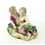 An early 20th century Meissen porcelain group, modelled as 'Boy and Girl', incised S54, underglaze