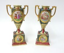 A pair of 20th century Ackeman & Fritze porcelain urns on pedestal bases, height 30cm
