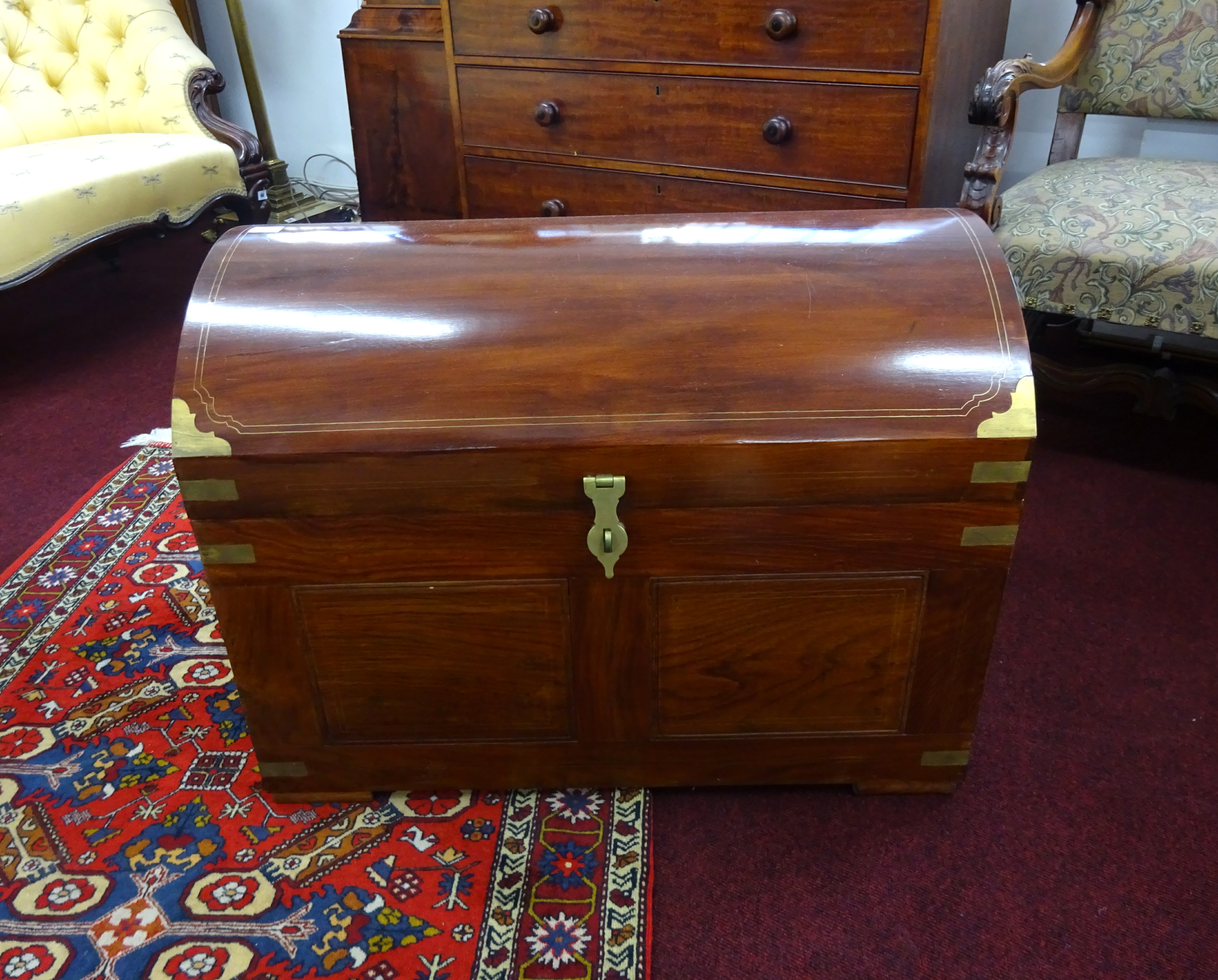 A nautical style chest with dome top, brass mounted, width 77cm.