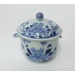 A Chinese blue and white porcelain handled bowl and cover (lacks one handle) height 11cm.