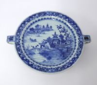 A Chinese porcelain blue and white warming plate, diameter 23cm.