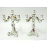 A pair of Schierholz Thuringian three branch candelabra, height 27cm.