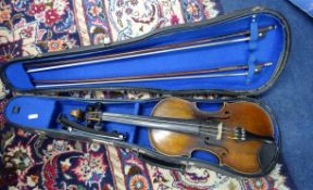 A violin, with two bows and case.