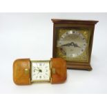 An Elliott mantle clock with dial marked 'Garrard & Co' of London, height 15cm, together with a