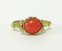 An 18ct coral set dress ring.