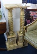 A pair of composition marble pedestals with parcel gilt decoration, height 104cm.