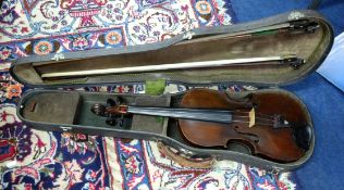 A violin with two bows, cased with paper label inside 'Aus L.Kamftens Sohne Musikaliselie,