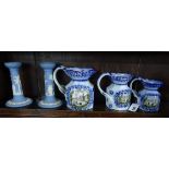 A Devonware Jardiniere on stand together with three graduated Victorian style jugs, and a pair of