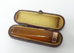 Early 20th century amber cheroot cigarette case.