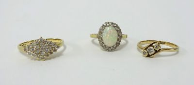 Three 18ct dress rings, including opal cluster, approx 9.30g.