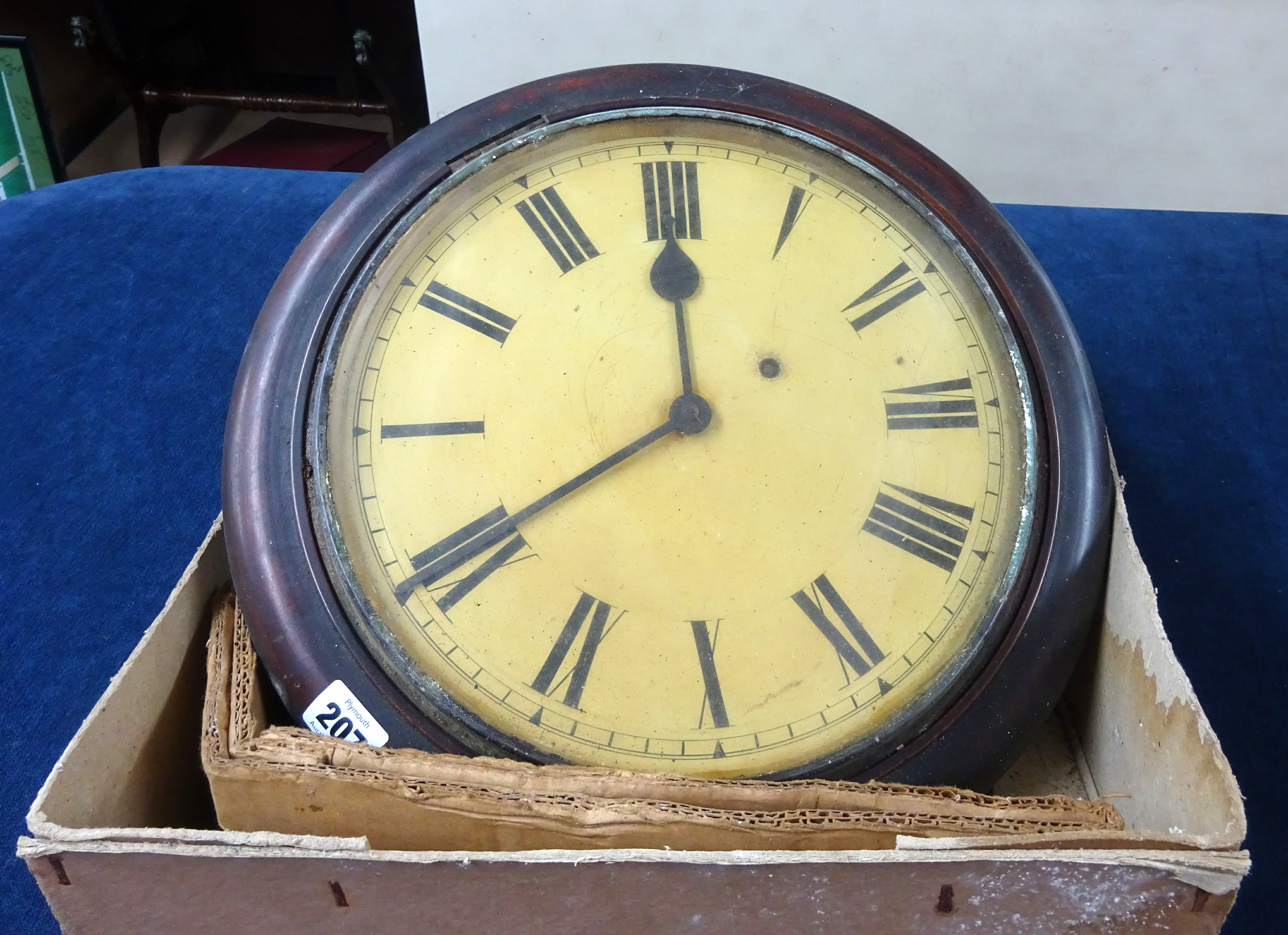 A Victorian dial clock, diameter 40cm (faults) together with a some longcase clock movements,