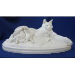 A large white marble sculpture, 'Cat Feeding Her Kittens', signed and dated, 'E. FREMIET 1863', 25.