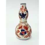 Japanese porcelain double gourd vase, height 14cm and egg cup.