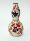 Japanese porcelain double gourd vase, height 14cm and egg cup.