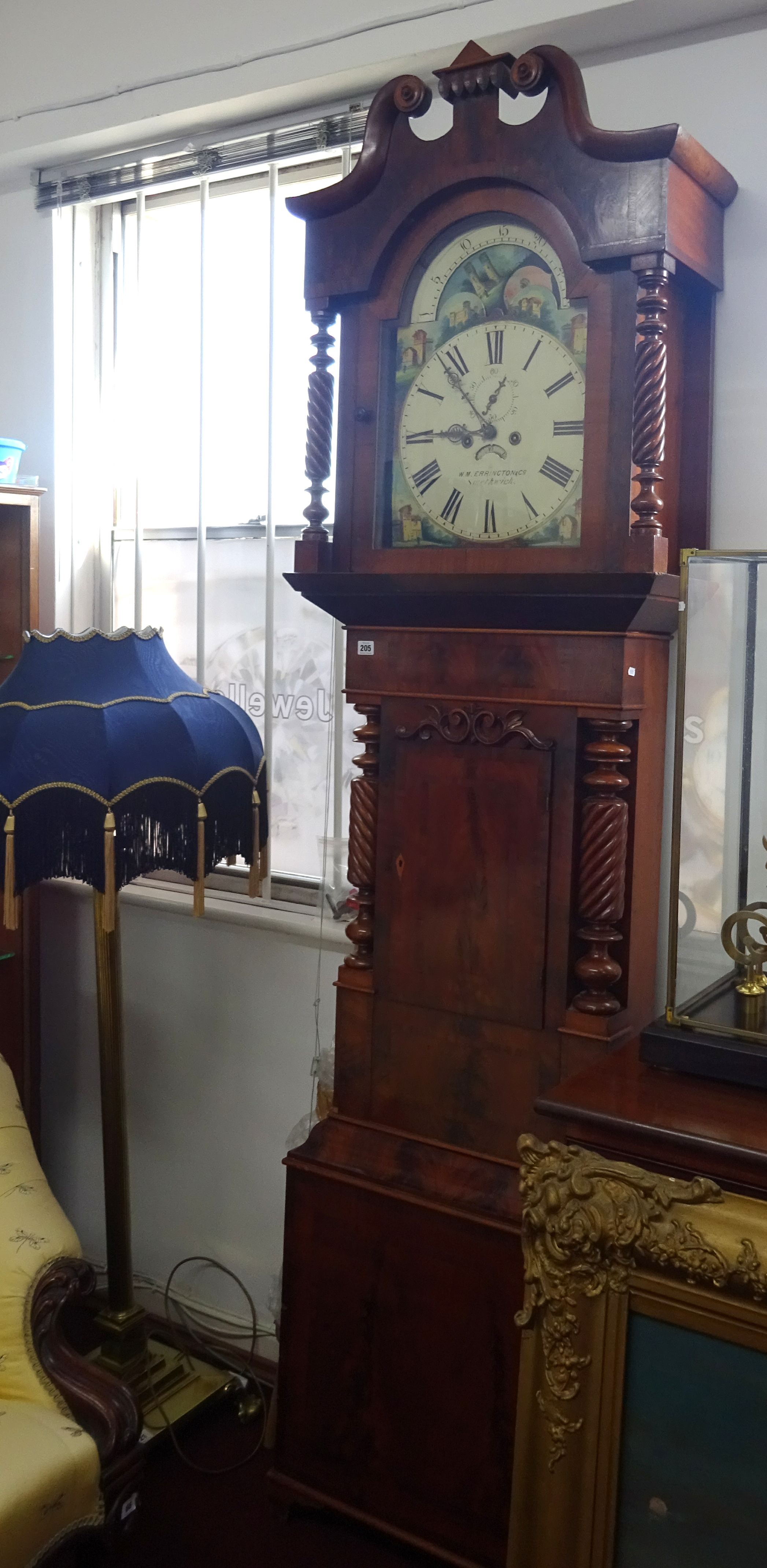 A Victorian mahogany longcase clock by W.M.Errington and Company, Smethwick arch painted dial, lunar