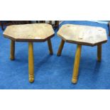 A pair of hardwood milking stools.