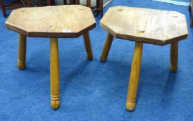 A pair of hardwood milking stools.