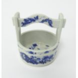 A Japanese blue and white porcelain 'Wishing Well' dish, height 13cm.