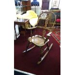 White Rose furniture (Yorkshire), a traditional style rocking chair, carved with 'White Rose'