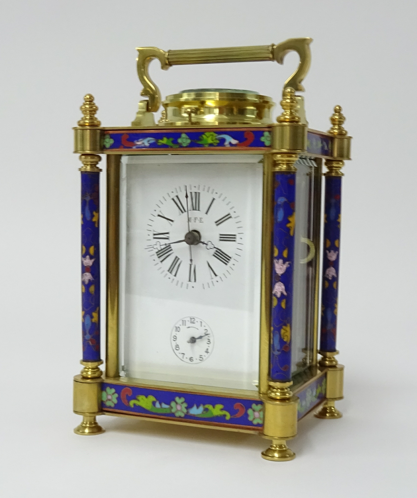 A large brass enamelled carriage clock with alarm and repeat, of Chinese style, height 20cm,